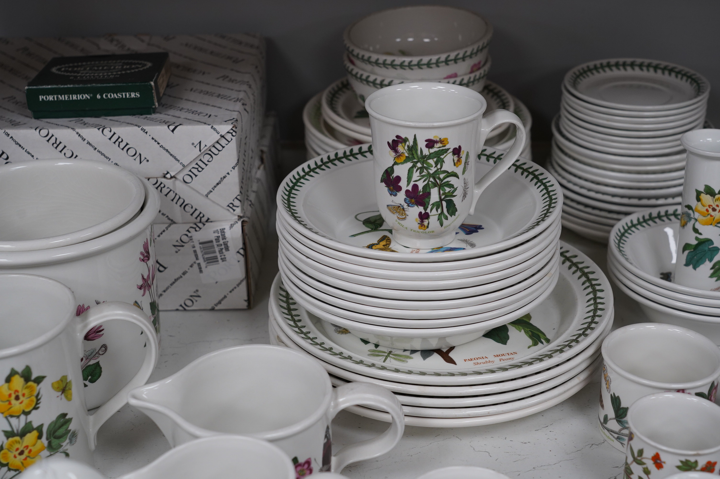 A mixed quantity of Portmeirion Botanic Garden tea, coffee and dinner wares, including a teapot, jugs, cups, plates, dishes, Jardene, etc. Condition - fair to good